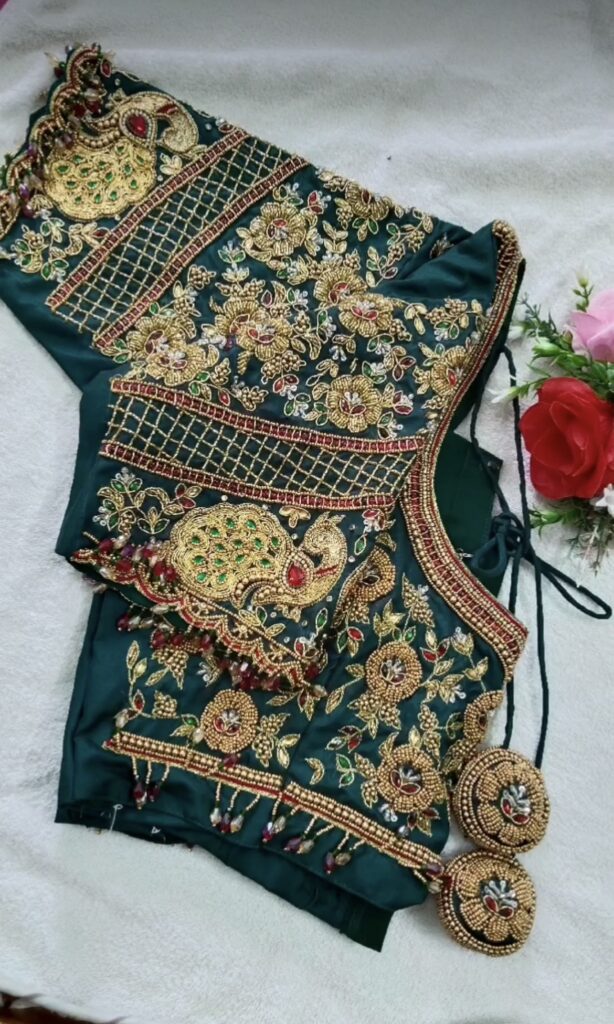 Heavy bridal Aari work blouse featuring intricate hand embroidery by an Aari Designer in Mayiladuthurai.