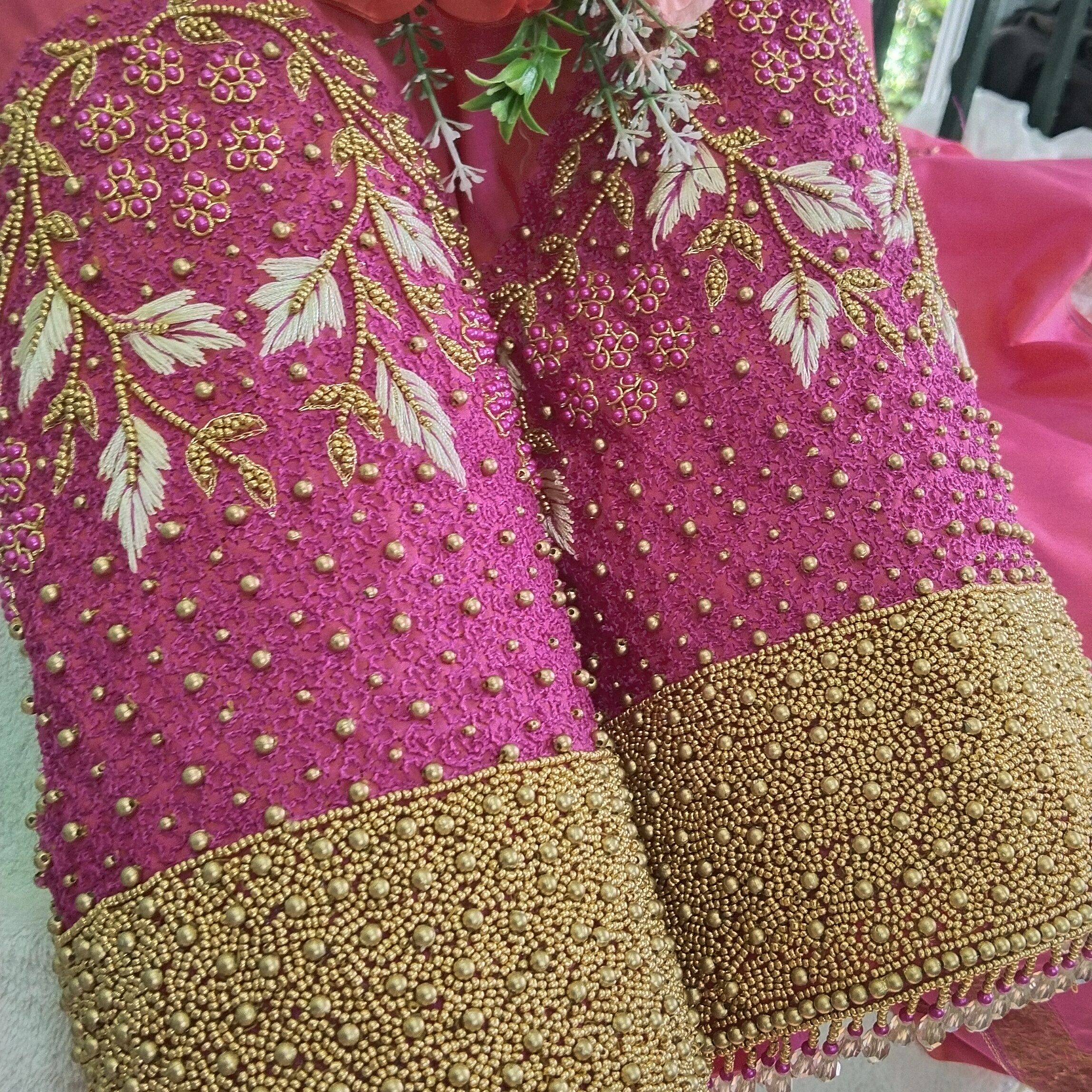 Vibrant Aari Work: Showcasing detailed hand embroidery and traditional patterns.